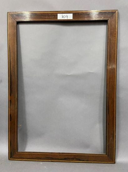 Grande baguette en bois et placage de palissandre...