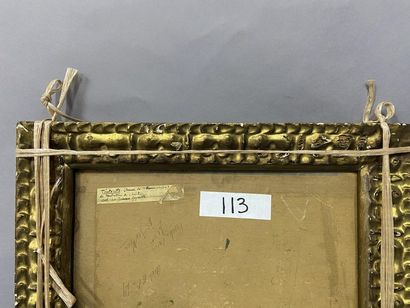 Cadre en bois sculpté et doré à décor de...