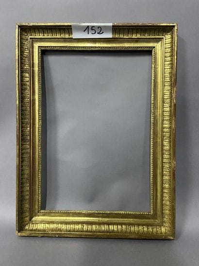 Wooden frame and gilded wood paste with palmette...