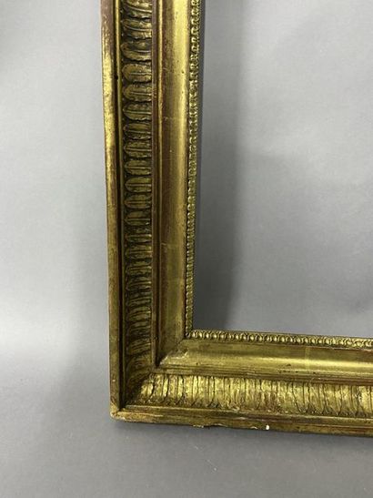 Wooden frame and gilded wood paste with palmette...