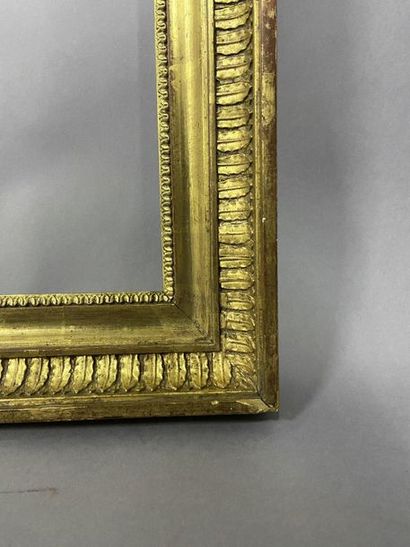 Wooden frame and gilded wood paste with palmette...