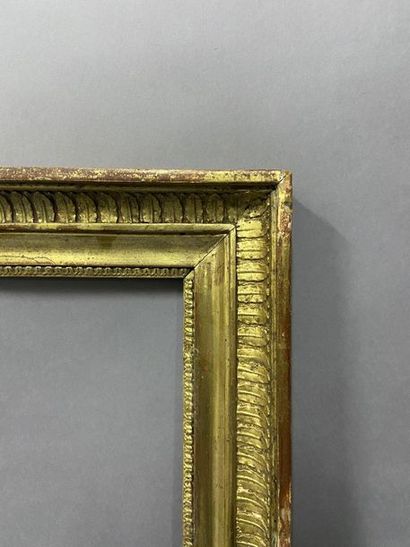 Wooden frame and gilded wood paste with palmette...