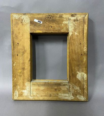 Carved and gilded wood frame with openwork...