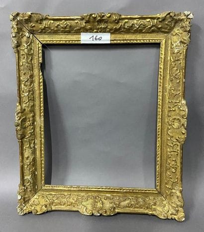 Carved and gilded oak frame with Bérain decoration

Louis...