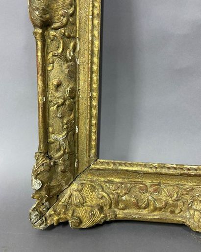 Carved and gilded oak frame with Bérain decoration

Louis...