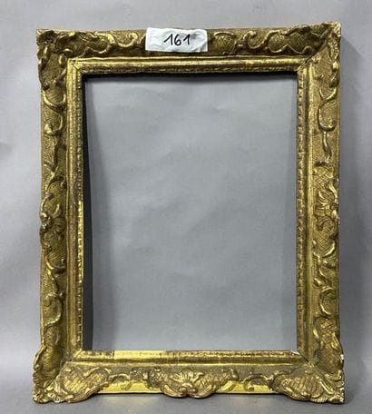 Carved and gilded oak frame with Bérain decoration

Louis...