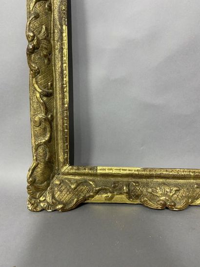 Carved and gilded oak frame with Bérain decoration

Louis...
