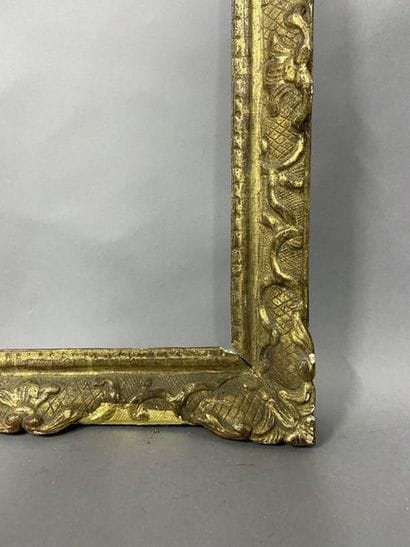 Carved and gilded oak frame with Bérain decoration

Louis...