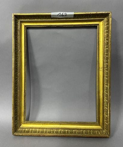 Wooden frame and gilded paste with palmette...