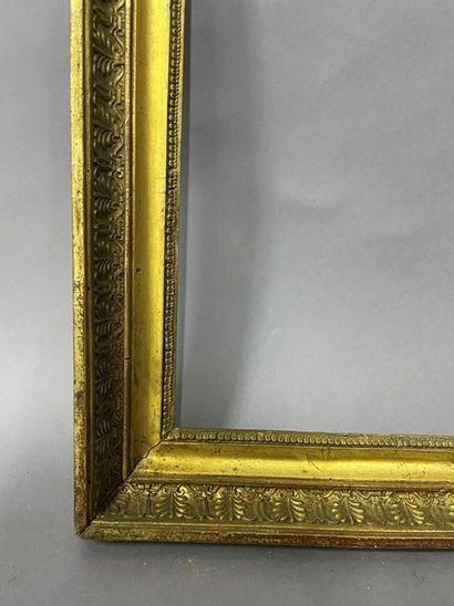 Wooden frame and gilded paste with palmette...