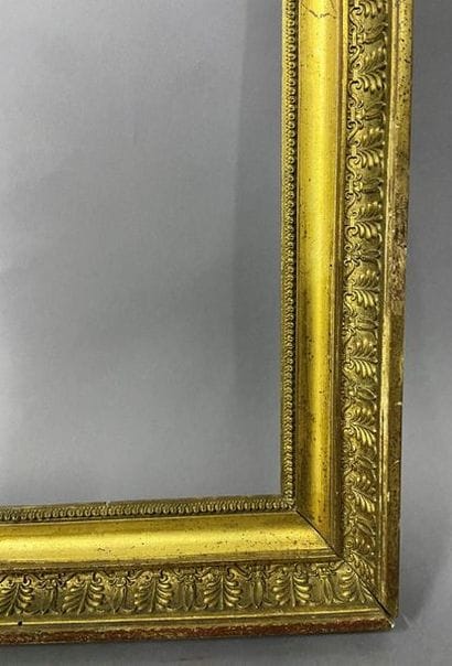Wooden frame and gilded paste with palmette...
