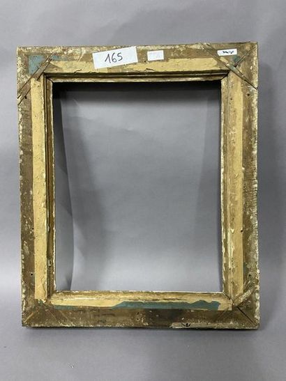 Sculpted and gilded lindenwood frame decorated...