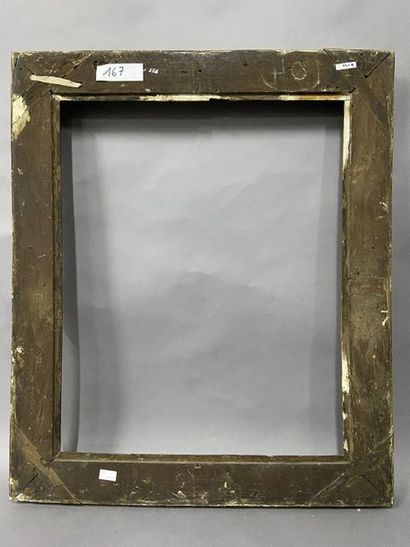 Sculpted and gilded oak frame with palmettes...