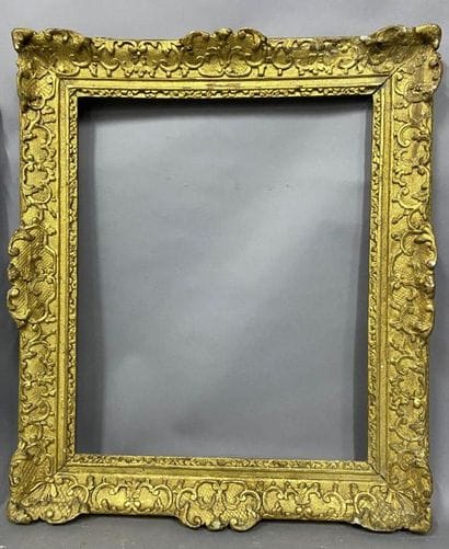 Carved and gilded oak frame with Bérain decoration

Louis...