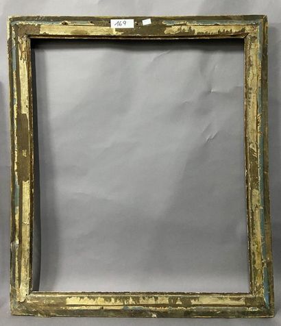 Carved and gilded oak frame with Bérain decoration...