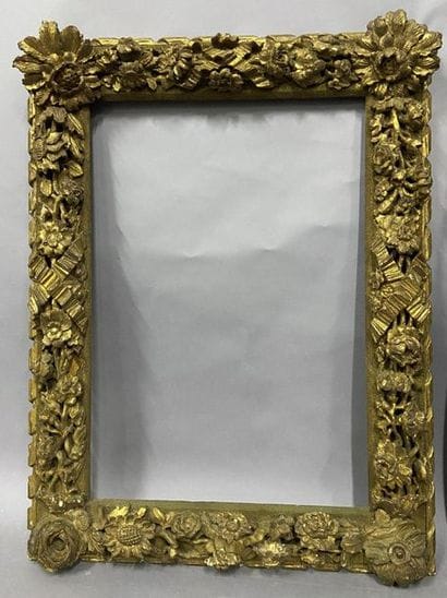 Gilded and carved wooden frame made of old...