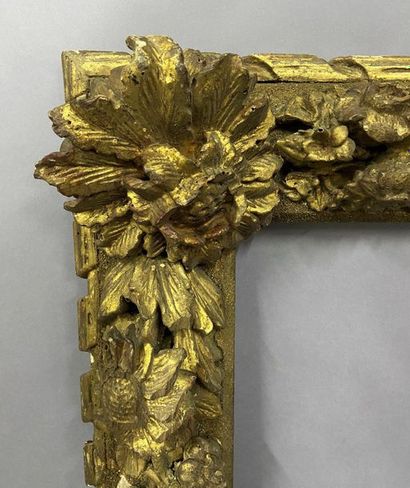Gilded and carved wooden frame made of old...