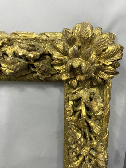 Gilded and carved wooden frame made of old...