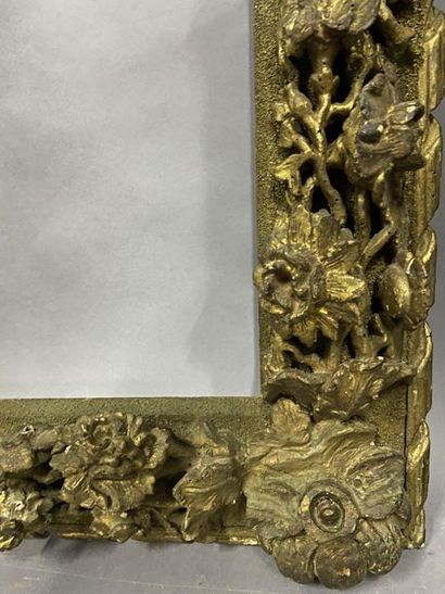 Gilded and carved wooden frame made of old...