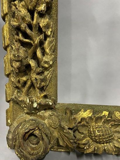 Gilded and carved wooden frame made of old...