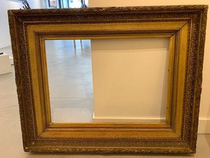 Wooden frame and gilded stucco, known as...