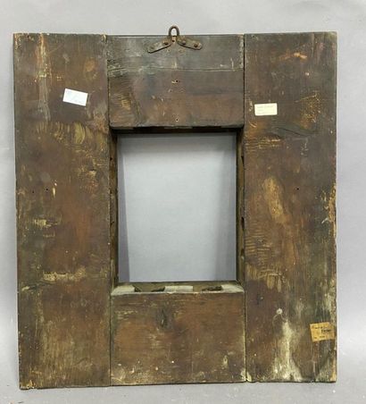 Moulded and blackened satin frame with an...