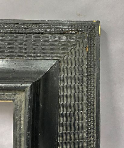 Moulded and blackened fir wood frame with...
