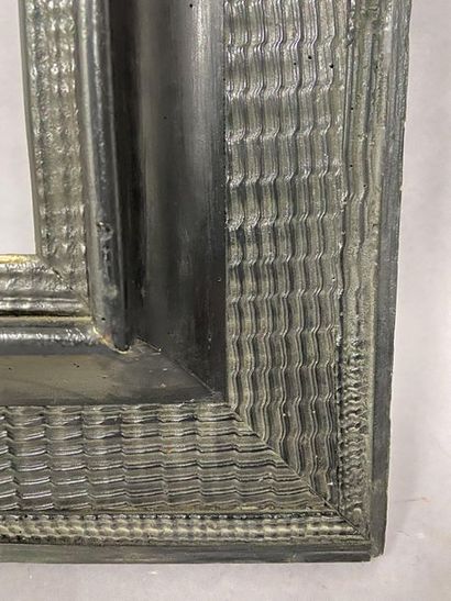 Moulded and blackened fir wood frame with...