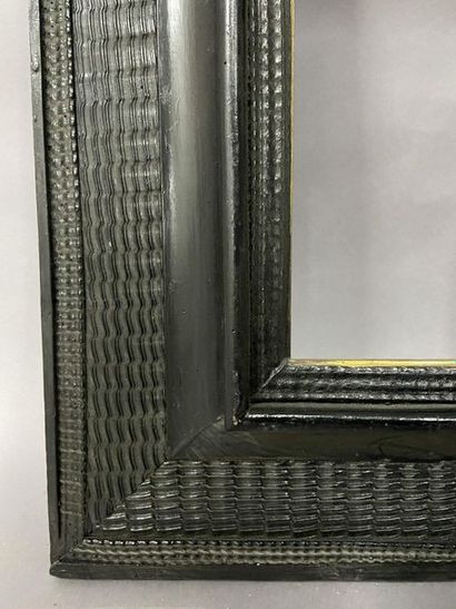 Moulded and blackened fir wood frame with...
