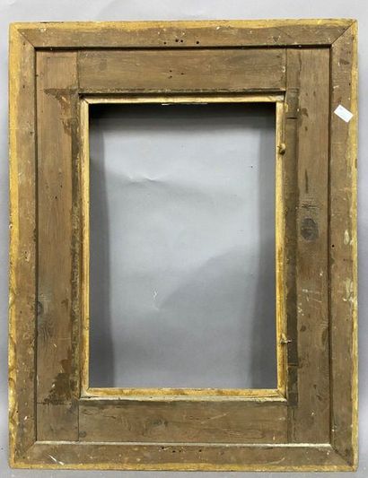 Carved and gilded wood frame with openwork...