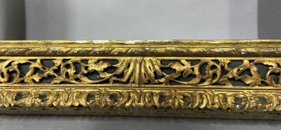 Carved and gilded wood frame with openwork...