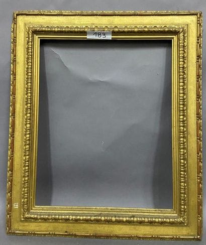 Sculpted and gilded lindenwood frame with...