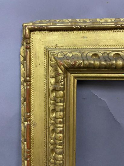 Sculpted and gilded lindenwood frame with...