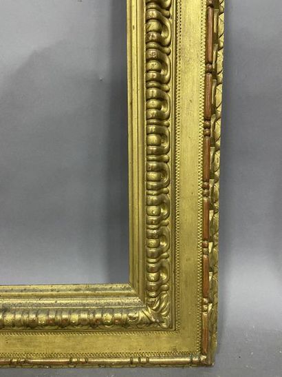 Sculpted and gilded lindenwood frame with...