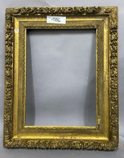Wooden frame and gilded stucco in the Louis...