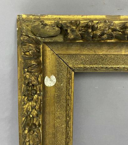 Wooden frame and gilded stucco in the Louis...