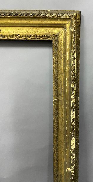 Sculpted and gilded fir wood frame with sandblasted...