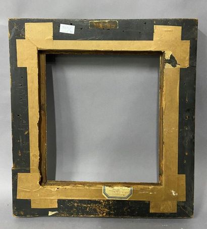 Blackened and moulded wooden frame with gold...