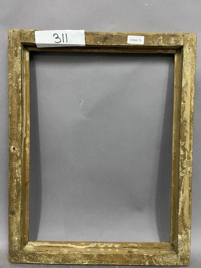 Baguette en bois, sculpté et doré, à décor...