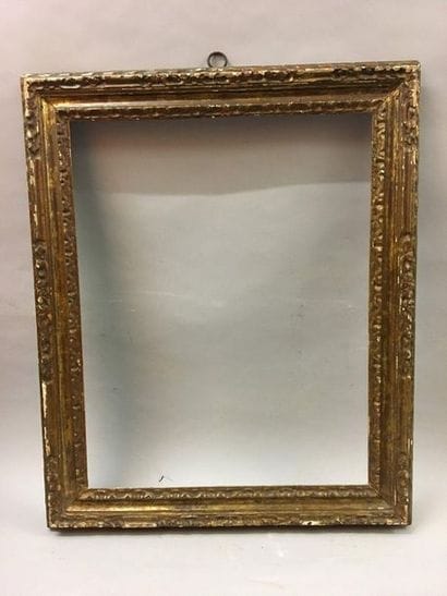 *Cadre en bois sculpté et anciennement doré

Bologne,...