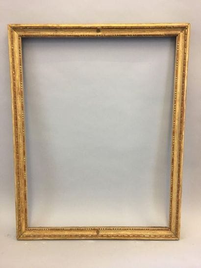 *Baguette en bois sculpté et anciennement...