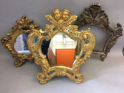 *Lot of three carved and gilded wooden frames...