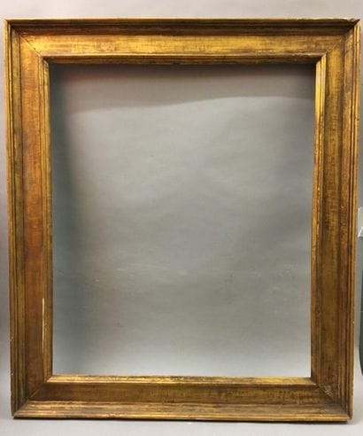 *Molded and gilded wood frame called 
