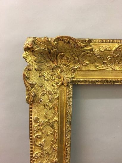 *Carved wooden frame with Bérain decoration

Louis...