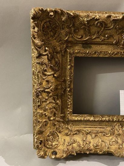 Carved and gilded oak frame with beautiful...
