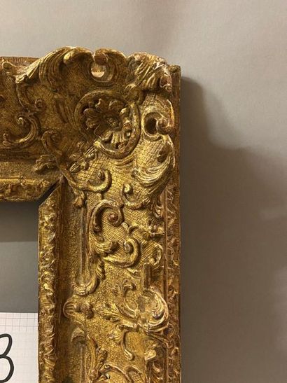 Carved and gilded oak frame with beautiful...