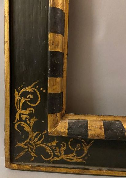 *Black and gold molded linden frame, called...