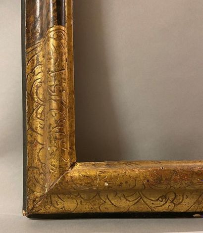 *Black and gold frame with upside down profile...