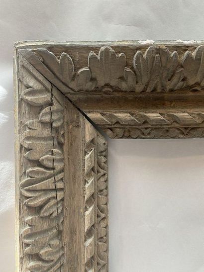 Carved natural oak frame with friezes, ribbons...