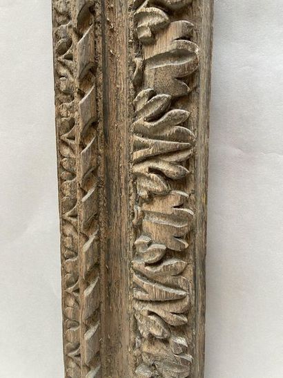Carved natural oak frame with friezes, ribbons...